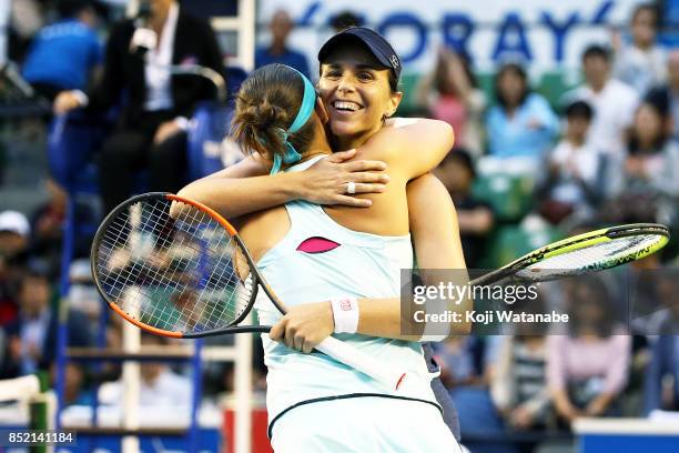 Maria Jose Martinez of Spain and Andreja Klepac of Slovenia celebrates winning after defeating Daria Gavrilova of Australia and Daria Kasatkina of...