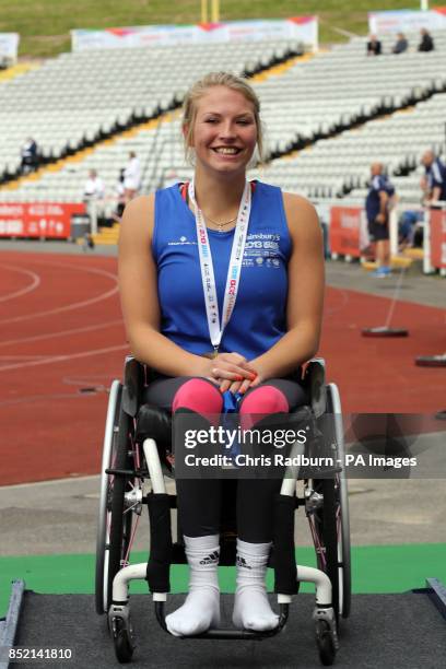 Scotland's Samantha Kinghorn celebrates winning gold for wheelchair 200m on day three of the 2013 Sainsburys School Games at Don Valley Stadium,...