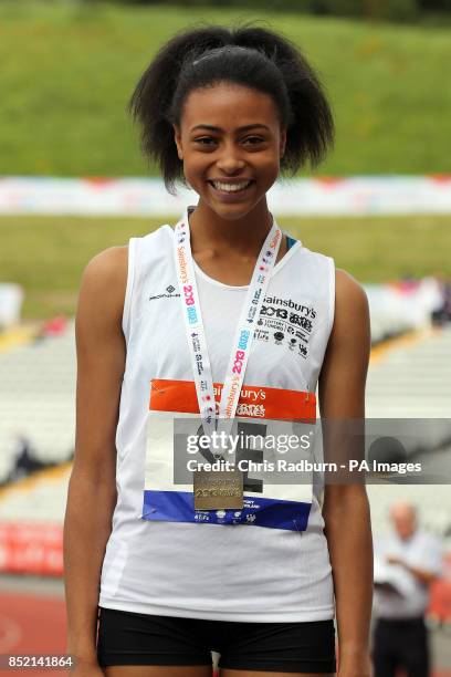 England South East's Shannon Hylton poses with her gold medal for girls 200m on day three of the 2013 Sainsburys School Games at Don Valley Stadium,...