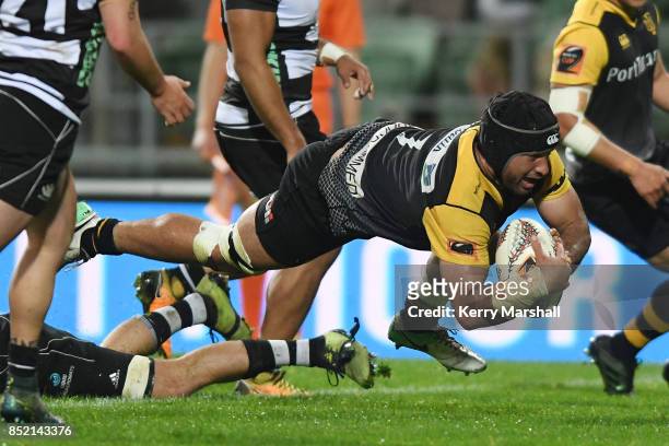Adrian Wyrill of Taranaki dives to score a try during the round six Mitre 10 Cup match between Hawke's Bay and Taranaki at McLean Park on September...