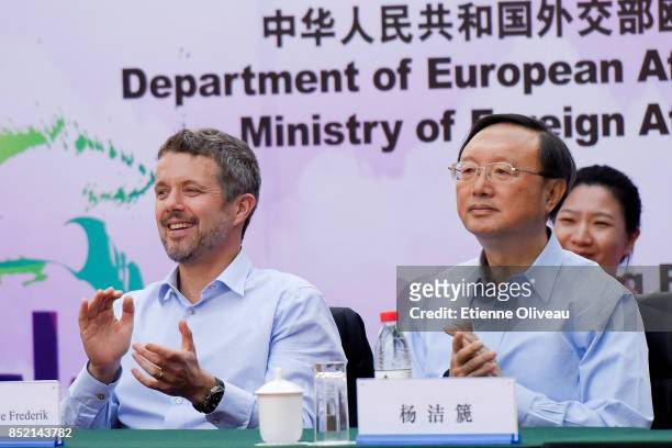 The Crown Prince Frederik of Denmark and Chinese State Counsellor Yang Jiechi applause the start of the final in the 3rd Sino-Nordic Cup Football...