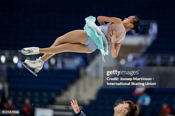 Feiyao Tang and Yongchao Yang of China compete in the Junior Pairs Free Skating during day three of the ISU Junior Grand Prix of Figure Skating at...