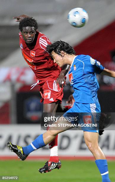 Ajaccio's French midfielder Benjamin Andre vies with Monaco's French forward Alexandre Licata during the French cup football match, Ajaccio vs....