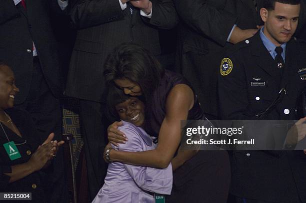 Feb. 24: First Lady Michelle Obama hugs Dillon, S.C. Student Ty'Sheoma Bethea before President Barack Obama's first address to a joint session of the...