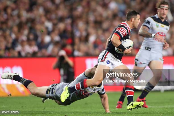 Michael Gordon of the Roosters evades a tackle during the NRL Preliminary Final match between the Sydney Roosters and the North Queensland Cowboys at...