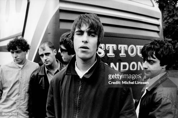 Photo of Noel GALLAGHER and Liam GALLAGHER and OASIS, L-R: Tony McCarroll, Paul 'Bonehead' Arthurs, Noel Gallagher, Liam Gallagher, Paul 'Guigsy'...