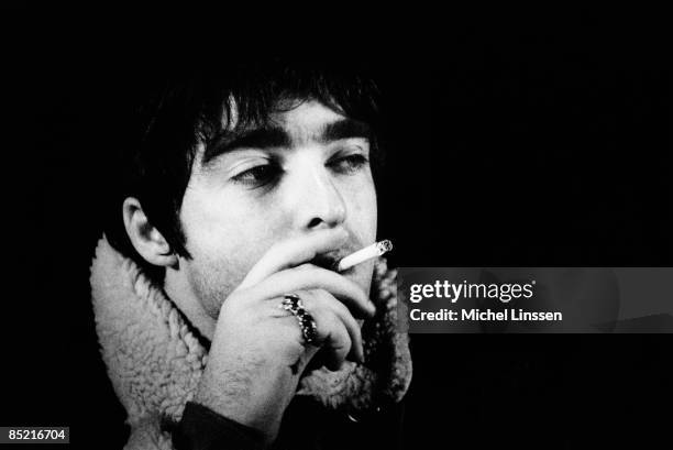 Photo of Noel GALLAGHER and OASIS, Noel Gallagher, posed, smoking cigarette