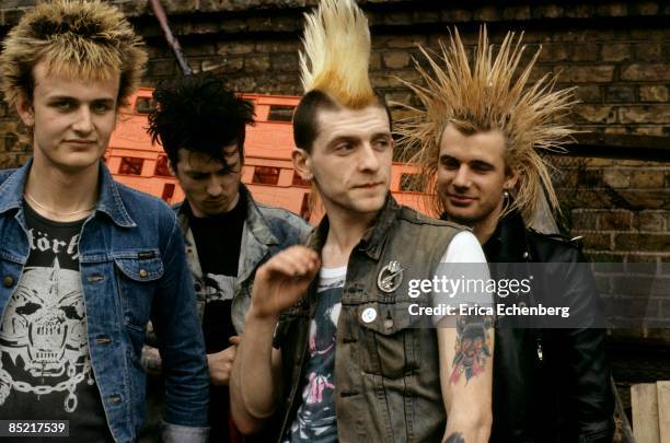 British street punk band GBH, Covent Garden, United Kingdom, 1982. Left to right: drummer Andrew 'Wilf' Williams, bassist Ross Lomas, guitarist Colin...