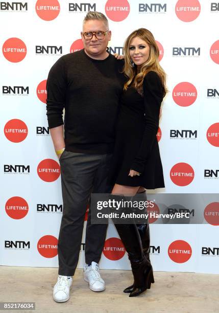 Giles Deacon and Abbey Clancy attend 'Britains Next Top Model' photocall during the London Fashion Week Festival at The Store Studios on September...