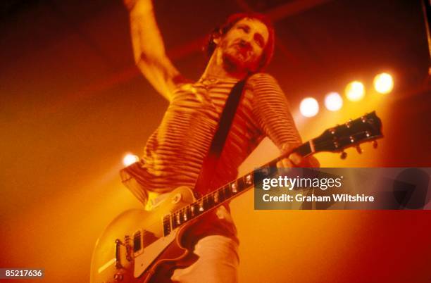 Photo of Pete TOWNSHEND and The Who, Pete Townshend performing live onstage, playing Gibson Les Paul guitar, doing 'windmill' arm