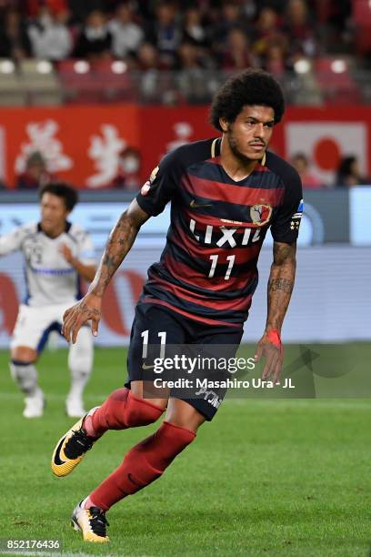 Leandro of Kashima Antlers celebrates scoring his side's first goal during the J.League J1 match between Kashima Antlers and Gamba Osaka at Kashima...