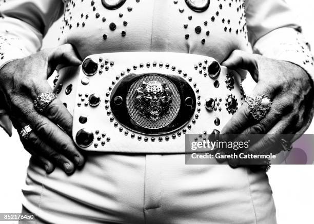 Duncan Mckellar A Tractor Combine Operator from Andover Hampshire poses in a portrait studio during the World's largest gathering of Elvis Presley...