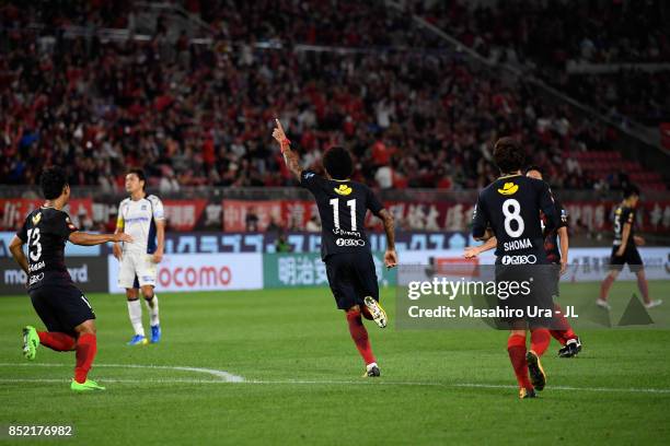 Leandro of Kashima Antlers celebrates scoring his side's first goal during the J.League J1 match between Kashima Antlers and Gamba Osaka at Kashima...