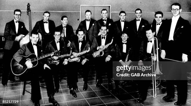 Circa 1935: Photo of Jack PAYNE and Henry HALL and BBC DANCE ORCHESTRA; with Henry Hall