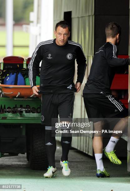 Chelsea's John Terry arrives for a training session at Cobham Training Ground, Stoke D'Abernon.