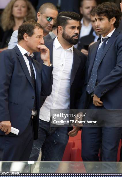 Atletico Madrid's forward from Spain Diego Costa follows the game from the stands during the Spanish league football match Club Atletico de Madrid vs...