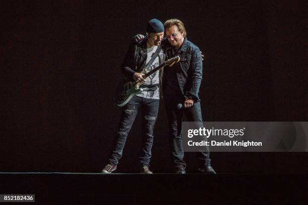 Musicians The Edge and Bono of U2 perform on stage on the final night of U2: The Joshua Tree Tour 2017 at SDCCU Stadium on September 22, 2017 in San...