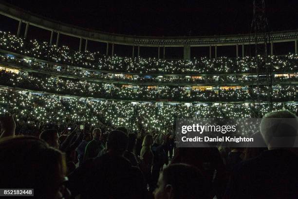 Fans light up the stadium using their cell phones on the final night of U2: The Joshua Tree Tour 2017 at SDCCU Stadium on September 22, 2017 in San...