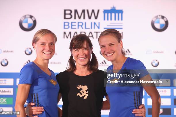 Anna Hahner attends with her sister Lisa Hahner and Uta Pippig a kids press conference at Hotel InterContinental Berlin ahead of the BMW Berlin...