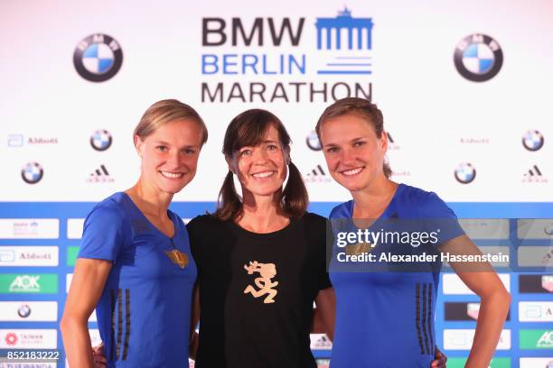 Anna Hahner attends with her sister Lisa Hahner and Uta Pippig a kids press conference at Hotel InterContinental Berlin ahead of the BMW Berlin...