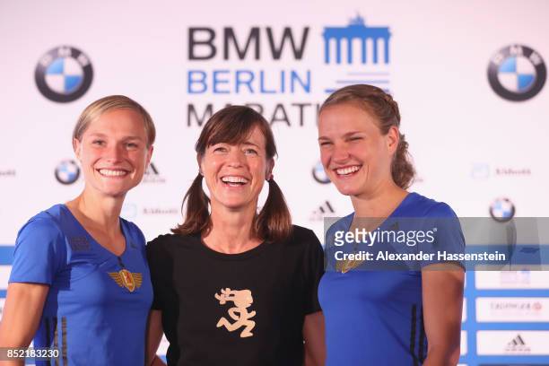 Anna Hahner attends with her sister Lisa Hahner and Uta Pippig a kids press conference at Hotel InterContinental Berlin ahead of the BMW Berlin...