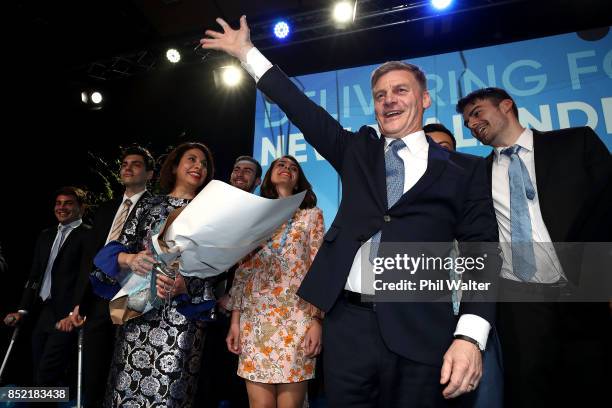 National Party leader Bill English waves to his supporters on September 23, 2017 in Auckland, New Zealand. With results too close to call, no...