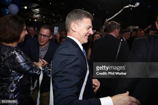 National Party leader Bill English waves to his supporters on September 23, 2017 in Auckland, New Zealand. With results too close to call, no...