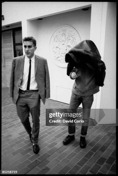 Photo of SPECIALS; Terry Hall & Jerry Dammers of The Specials after being cleared of inciting racial hatred at a concert. St Alban's Court 1980