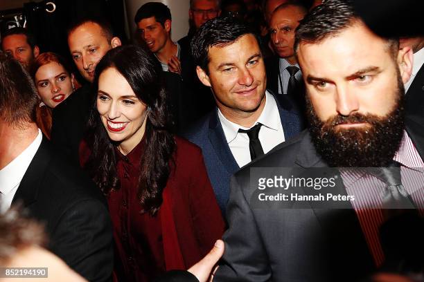 Labour Party leader Jacinda Ardern arrives with her partner Clarke Gayford at the Labour Party election party on September 23, 2017 in Auckland, New...