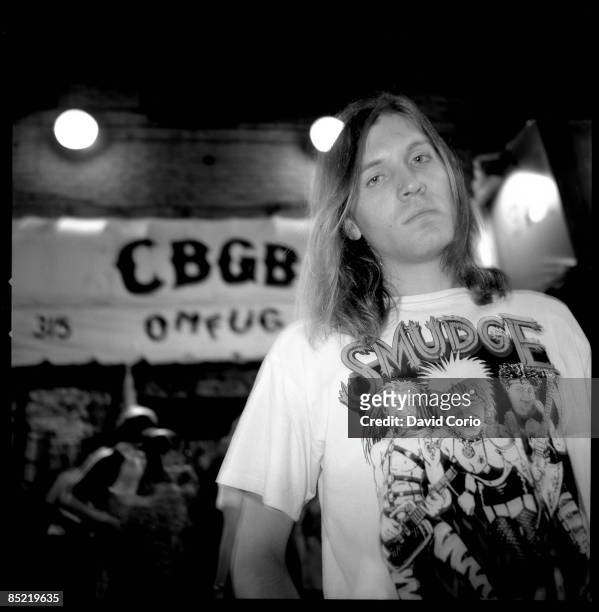 Photo of Evan DANDO, of the group the LEMONHEADS in the Bowery outside of CBGB's