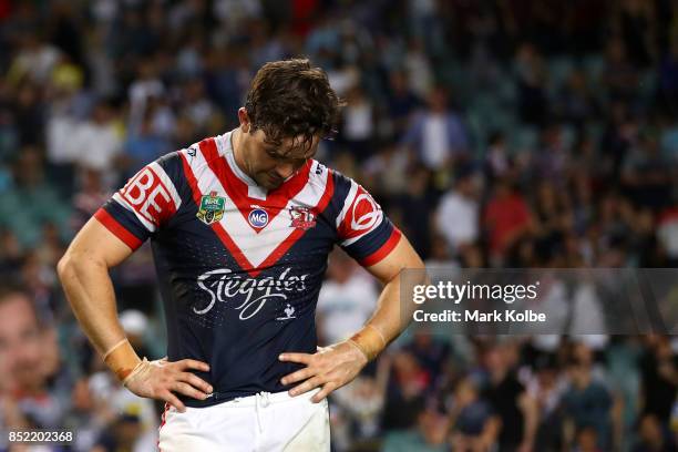 Aidan Guerra of the Roosters looks dejected after defeat during the NRL Preliminary Final match between the Sydney Roosters and the North Queensland...