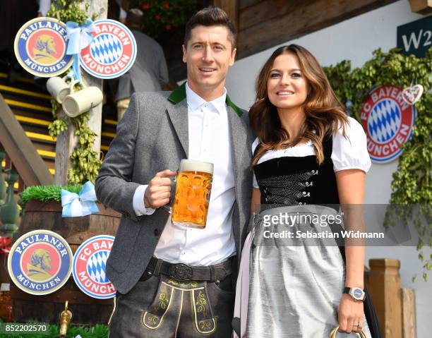 Robert Lewandowski of FC Bayern Muenchen and his wife Anna Stachurska attend the Oktoberfest beer festival at Kaefer Wiesnschaenke tent at...