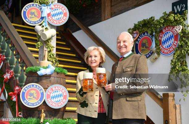 Edmund Stoiber and his wife Karin Stoiber attend the Oktoberfest beer festival at Kaefer Wiesnschaenke tent at Theresienwiese on September 23, 2017...