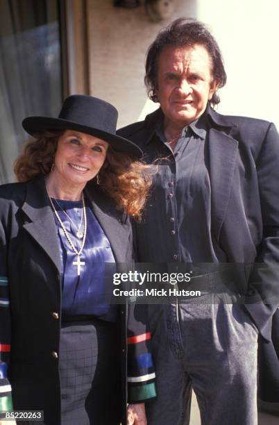 Photo of June CARTER and Johnny CASH, Portrait of Johnny Cash with wife June Carter Cash