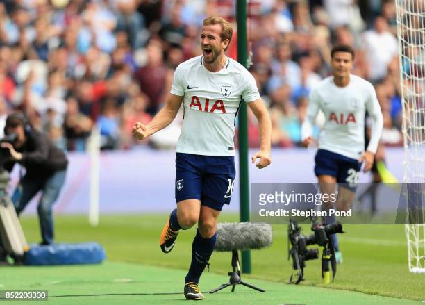 Harry Kane of Tottenham Hotspur celebrates scoring his sides first goal during the Premier League match between West Ham United and Tottenham Hotspur...