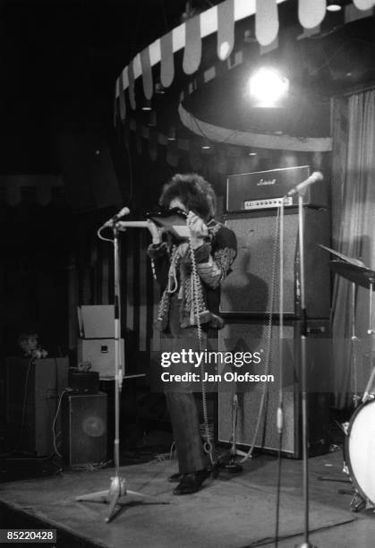 Photo of JIMI HENDRIX EXPERIENCE and Jimi HENDRIX, with Jimi Hendrix Experience, performing live onstage for German TV Show 'Beat Club', playing...