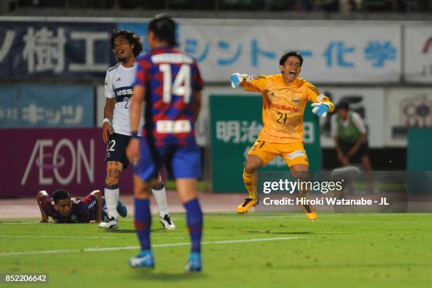 Hiroki Iikura of Yokohama F.Marinos protesst against the penalty decision after his challenge on Dudu of Ventforet Kofu during the J.League J1 match...