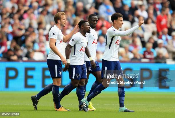 Harry Kane of Tottenham Hotspur celebrates scoring his sides second goal with his Tottenham Hotspur team mates during the Premier League match...