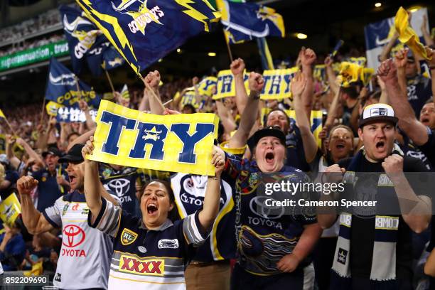 Cowboys fans celebrate a try during the NRL Preliminary Final match between the Sydney Roosters and the North Queensland Cowboys at Allianz Stadium...