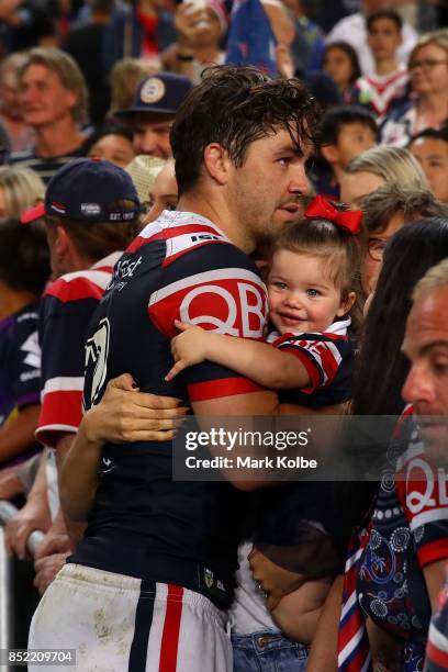 Aidan Guerra of the Roosters hugs his family after defeat during the NRL Preliminary Final match between the Sydney Roosters and the North Queensland...