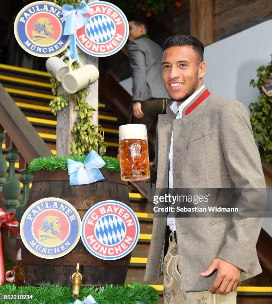 Corentin Tolisso of FC Bayern Muenchen atttends the Oktoberfest beer festival at Kaefer Wiesnschaenke tent at Theresienwiese on September 23, 2017 in...