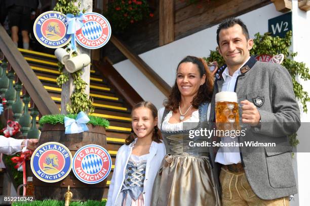 Hasan, Brazzo, Salihamidzic, his wife Esther Copado and their daughter attend the Oktoberfest beer festival at Kaefer Wiesnschaenke tent at...