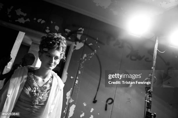 Model is seen backstage ahead of the Antonio Marras show during Milan Fashion Week Spring/Summer 2018on September 23, 2017 in Milan, Italy. )