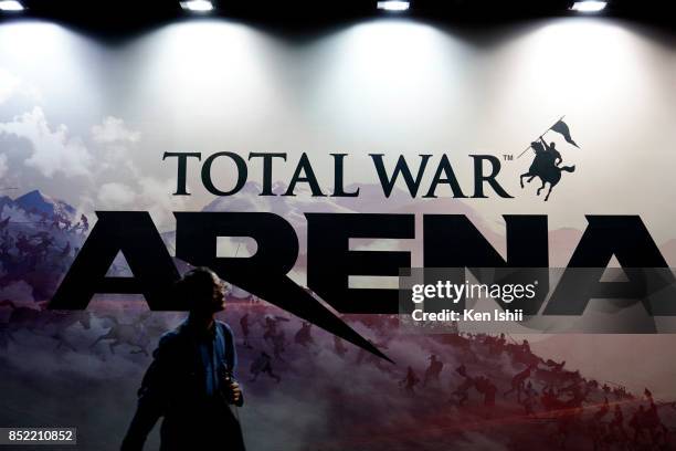 Visitor walks past the Wargaming Japan booth during the Tokyo Game Show 2017 at Makuhari Messe on September 23, 2017 in Chiba, Japan.