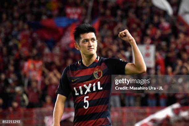 Naomichi Ueda of Kashima Antlers applauds supporters after his side's 2-1 victory in the J.League J1 match between Kashima Antlers and Gamba Osaka at...