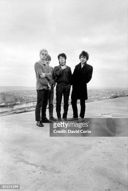 Group portrait of U2 on the roof of the Cork Country Club Hotel, Cork, Ireland March 2 1980. L-R Adam Clayton, Larry Mullen Jnr, Bono and The Edge.