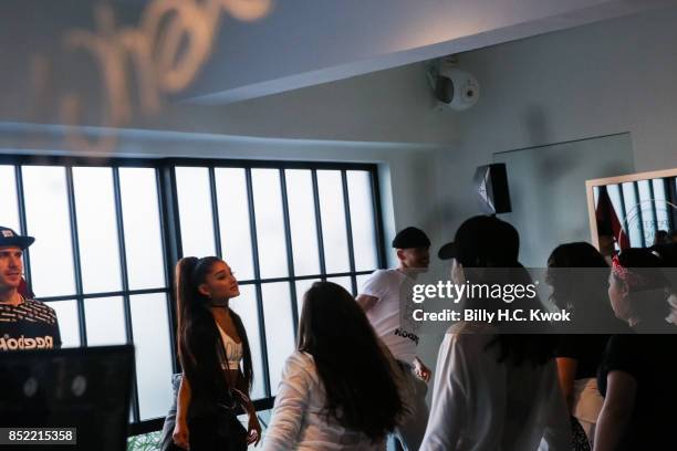 Twin dancers Brian Nicholson, Scott Nicholson and Ariana Grande attend An Inspiring "Day in the Life" of Ariana Grande to celebrate new partnership...