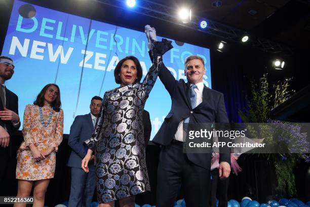 Leader of the National Party Bill English and his wife Mary react onstage at the party's election event at SkyCity Convention Centre in Auckland on...