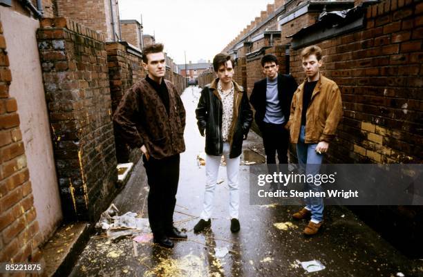 Photo of Andy ROURKE and Johnny MARR and MORRISSEY and The Smiths and Mike JOYCE; L-R: Morrissey, Johnny Marr, Mike Joyce, Andy Rourke - posed, group...