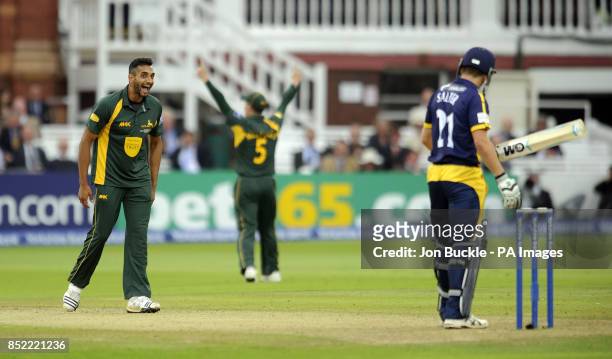 Nottinghamshire's Ajmal Shahzad celebrates claiming the wicket of Glamorgan's Andrew Salter during the Yorkshire Bank Pro40 Final at Lord's Cricket...
